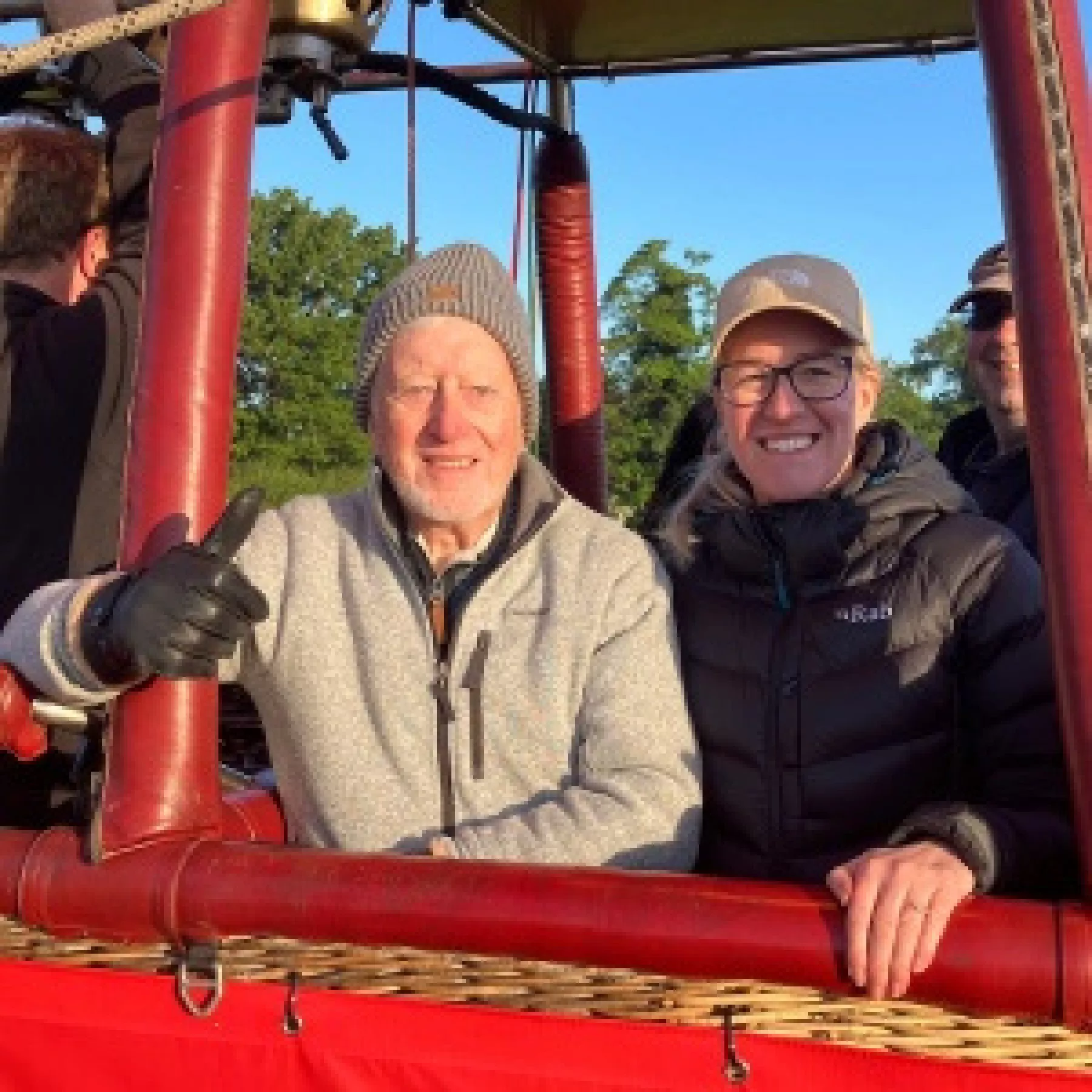 A father and daughter happy balloon ride customers