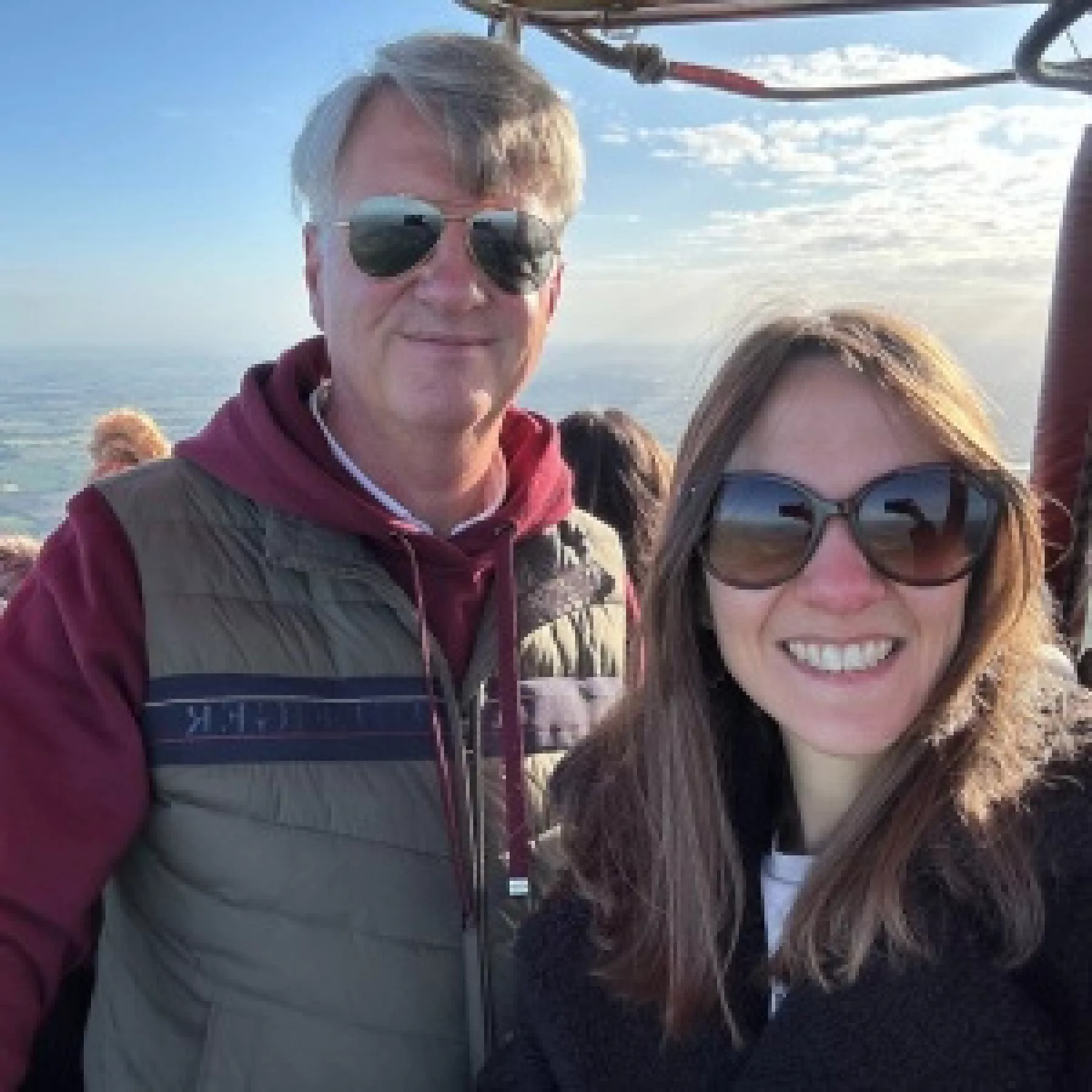 Father and daughter enjoying a hot air balloon ride